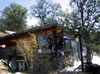 House of Stone, Rammed Earth, Recycled Lumber and Timber Thumbnail 1
