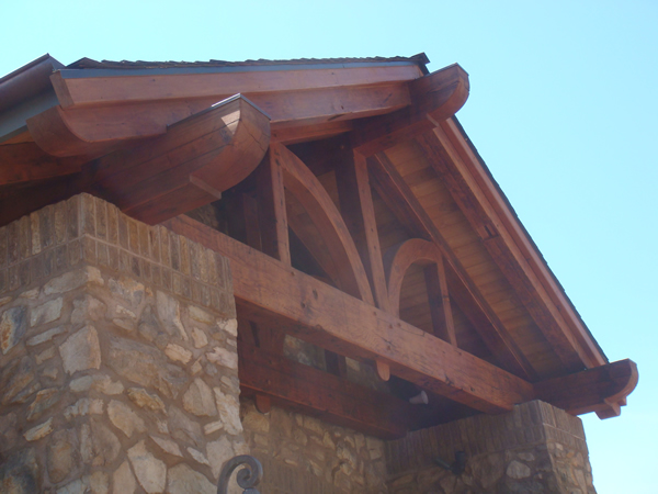Exterior Gable with Outriggers and Trusses from Reclaimed Wood